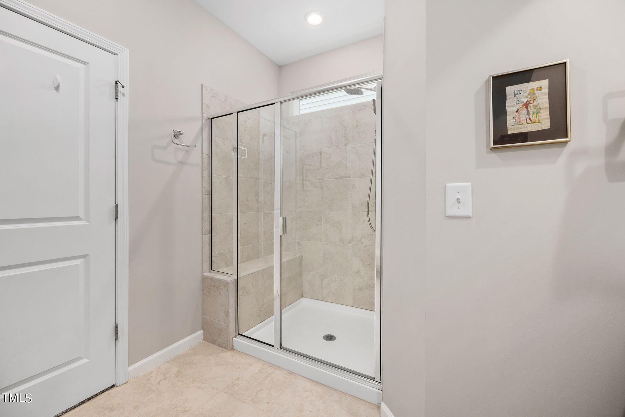 1016 Epiphany Road Morrisville, NC 27560 - Photo 23 of 45 a bathroom with a glass shower door