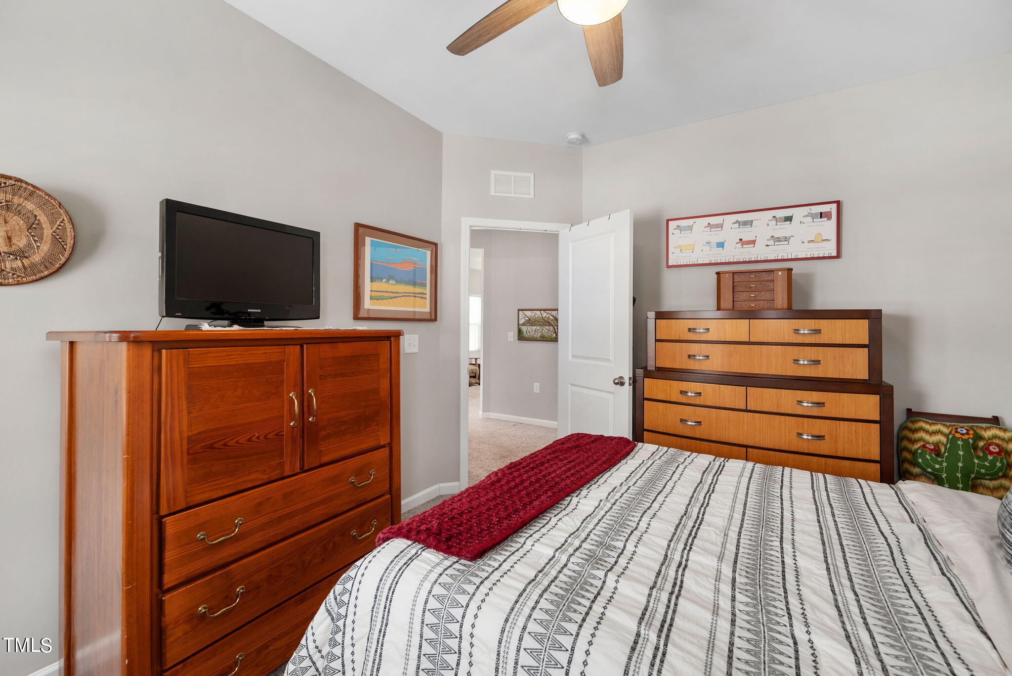 1016 Epiphany Road Morrisville, NC 27560 - Photo 25 of 45 a bedroom with a bed and furniture