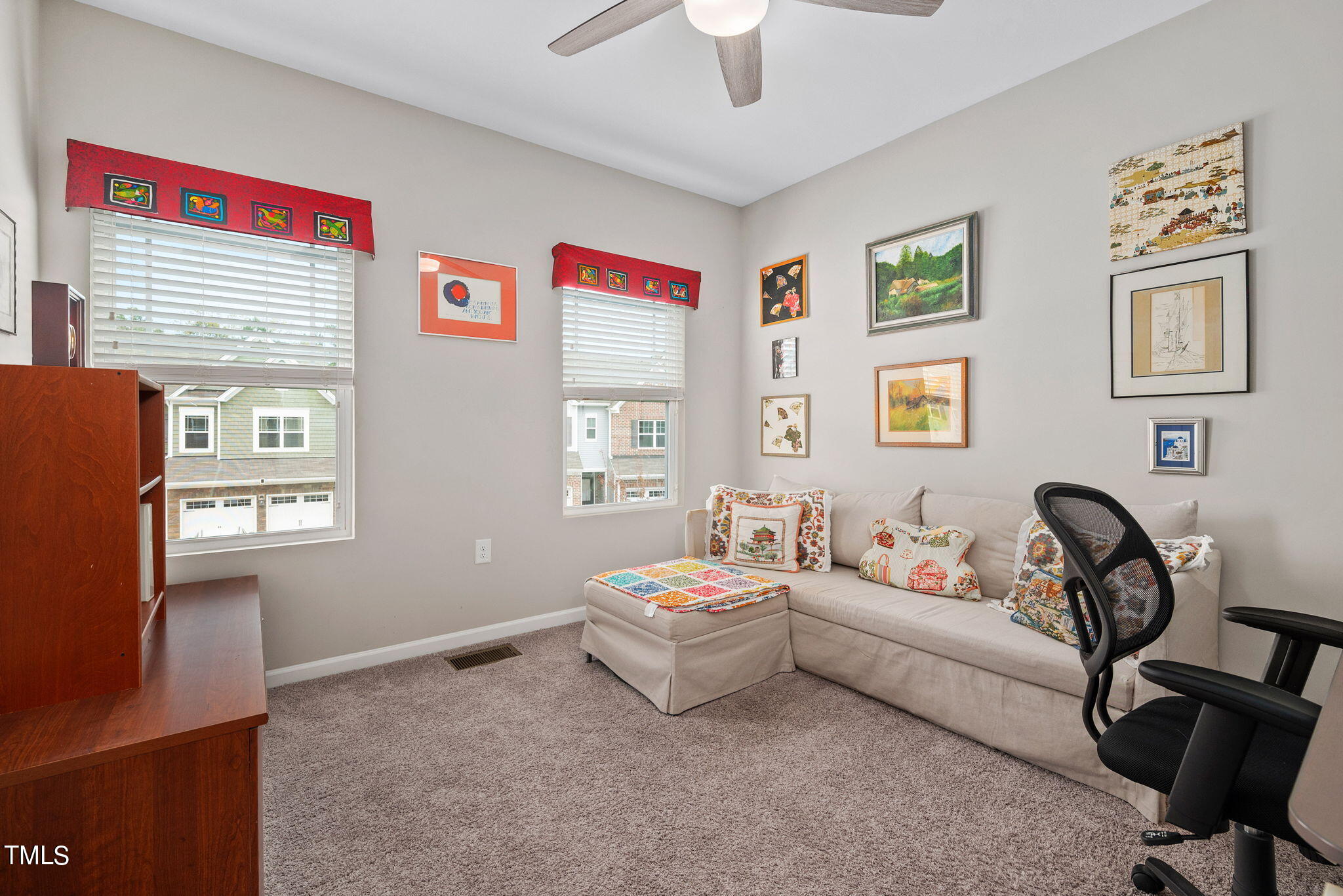 1016 Epiphany Road Morrisville, NC 27560 - Photo 27 of 45 a living room with furniture and a window