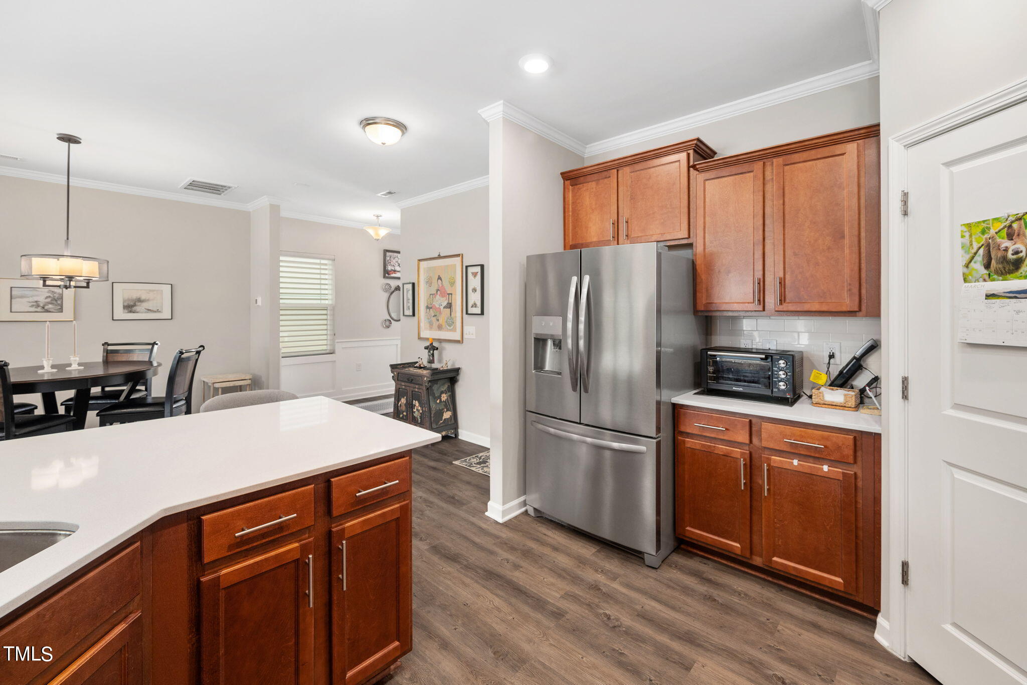 1016 Epiphany Road Morrisville, NC 27560 - Photo 8 of 45 a kitchen with stainless steel appliances a refrigerator and a stove top oven