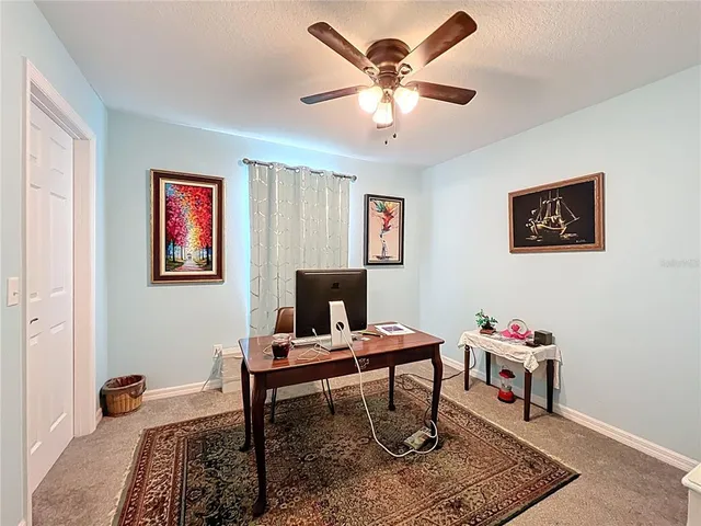 a workspace with wooden floor and a workspace