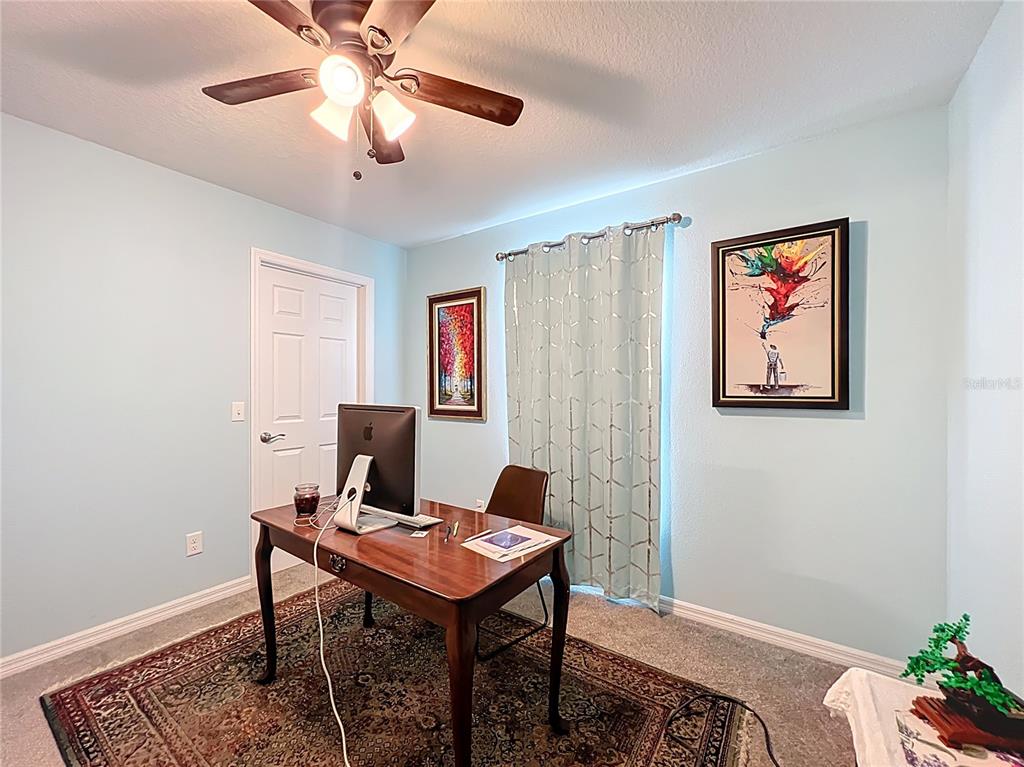 4501 East Ravenna Street Inverness, FL 34453 - Photo 18 of 31 a view of a workspace with furniture