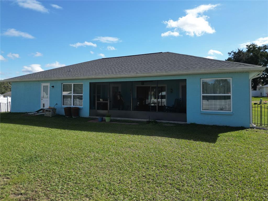 4501 East Ravenna Street Inverness, FL 34453 - Photo 27 of 31 a front view of a house with a yard