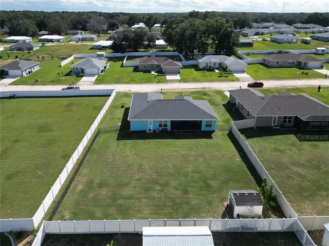 a view of yard with outdoor seating