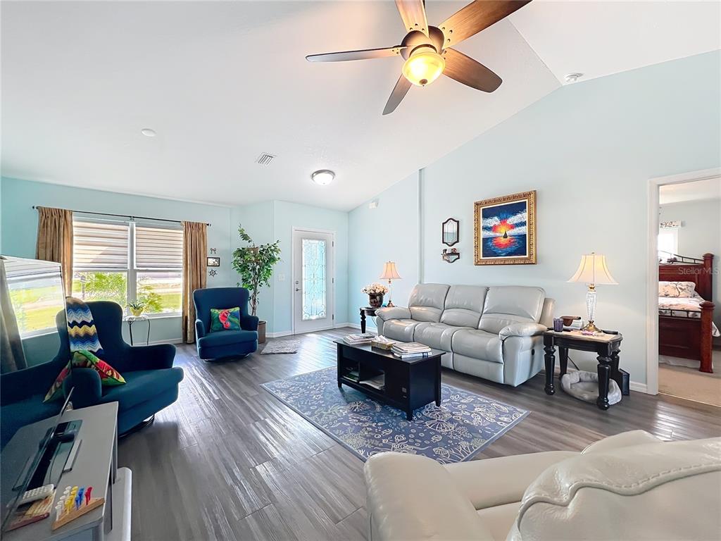 4501 East Ravenna Street Inverness, FL 34453 - Photo 4 of 31 a living room with furniture or couch and a window