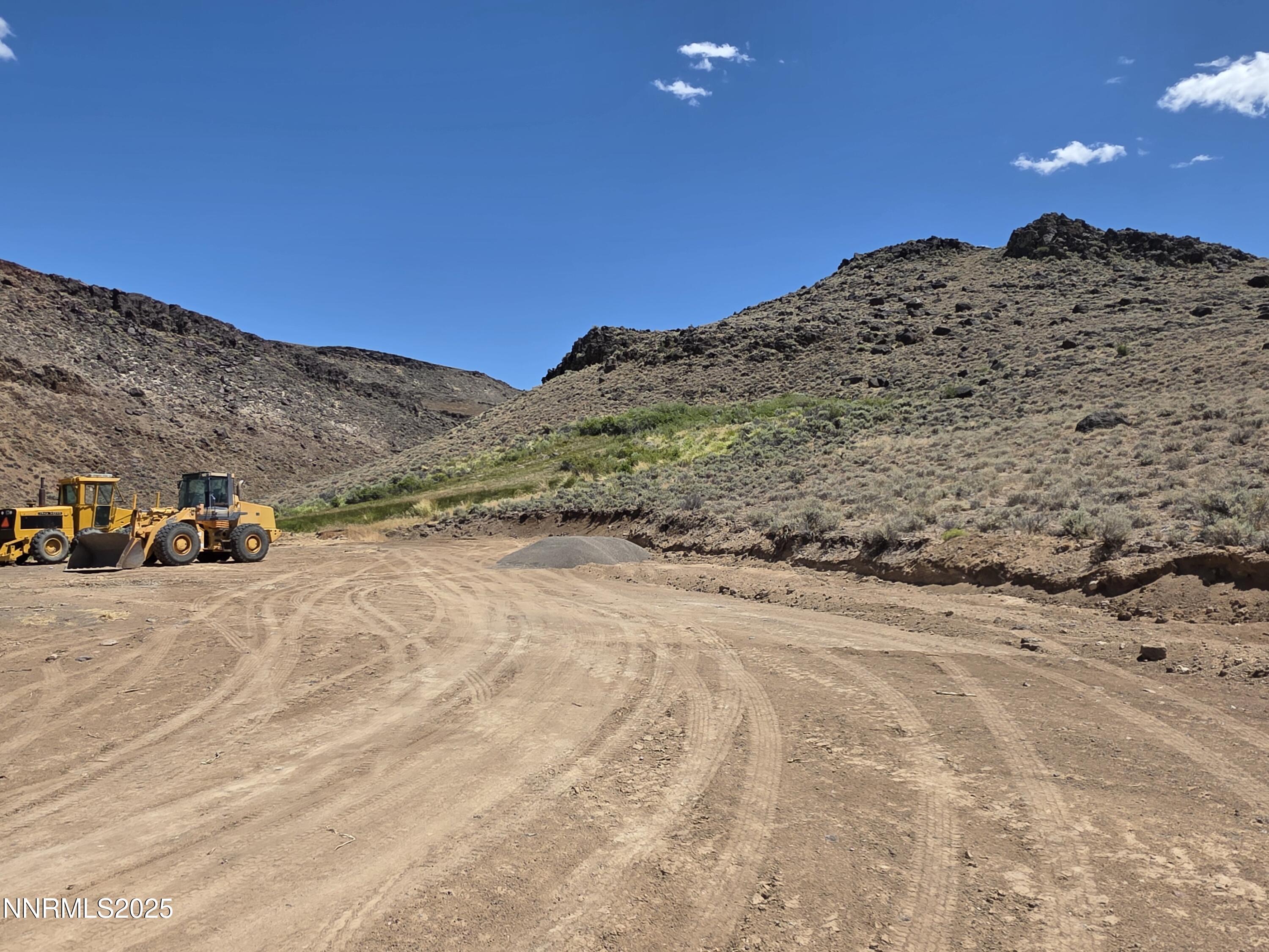 3305 High Rock Road Reno, NV 89510 - Photo 18 of 36 a view of a road with a mountain in the background