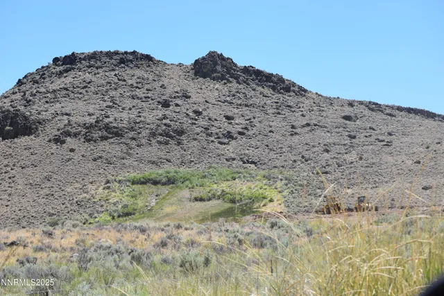 a view of lake and mountain