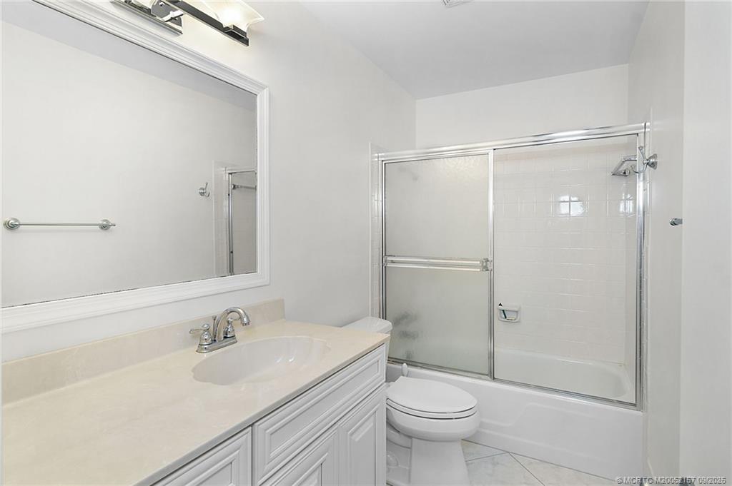 2600 Southeast Ocean Boulevard, Unit H15 Stuart, FL 34996 - Photo 17 of 27 a bathroom with a sink toilet and shower