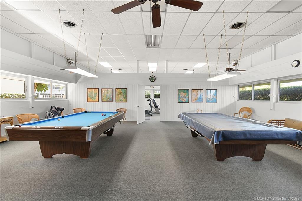 2600 Southeast Ocean Boulevard, Unit H15 Stuart, FL 34996 - Photo 23 of 27 a living room with furniture pool table furniture and a window
