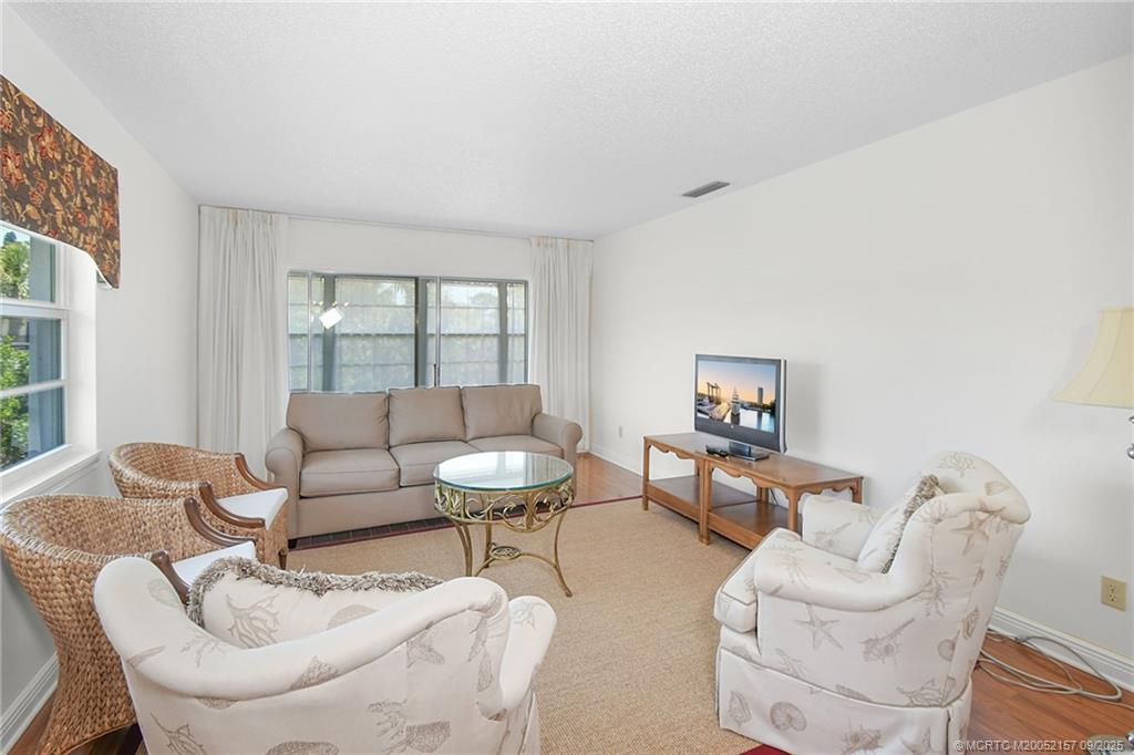 2600 Southeast Ocean Boulevard, Unit H15 Stuart, FL 34996 - Photo 9 of 27 a living room with furniture and a window