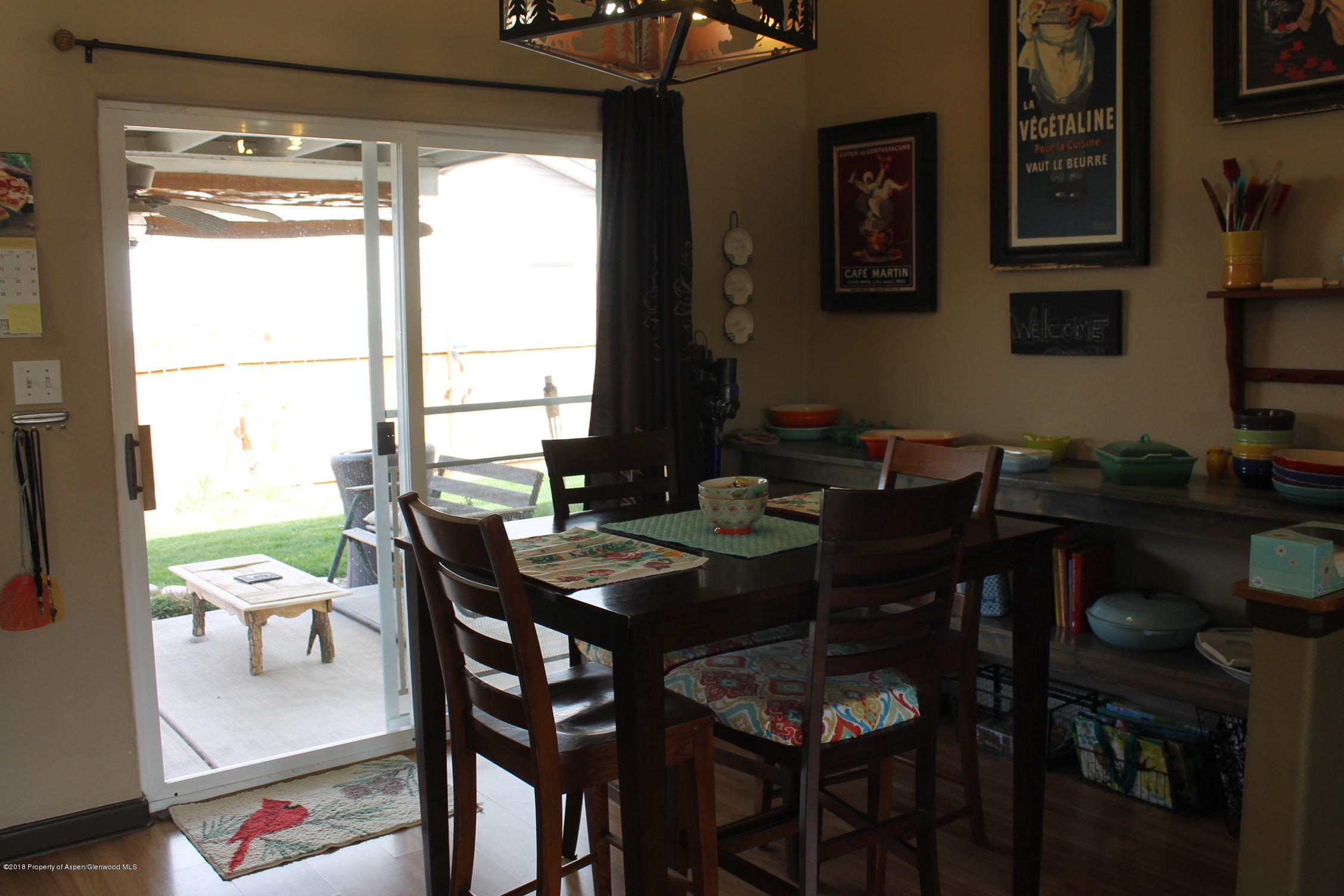 1561 East 12th Street Rifle, CO 81650 - Photo 14 of 23 a view of a dining room with furniture window and outside view