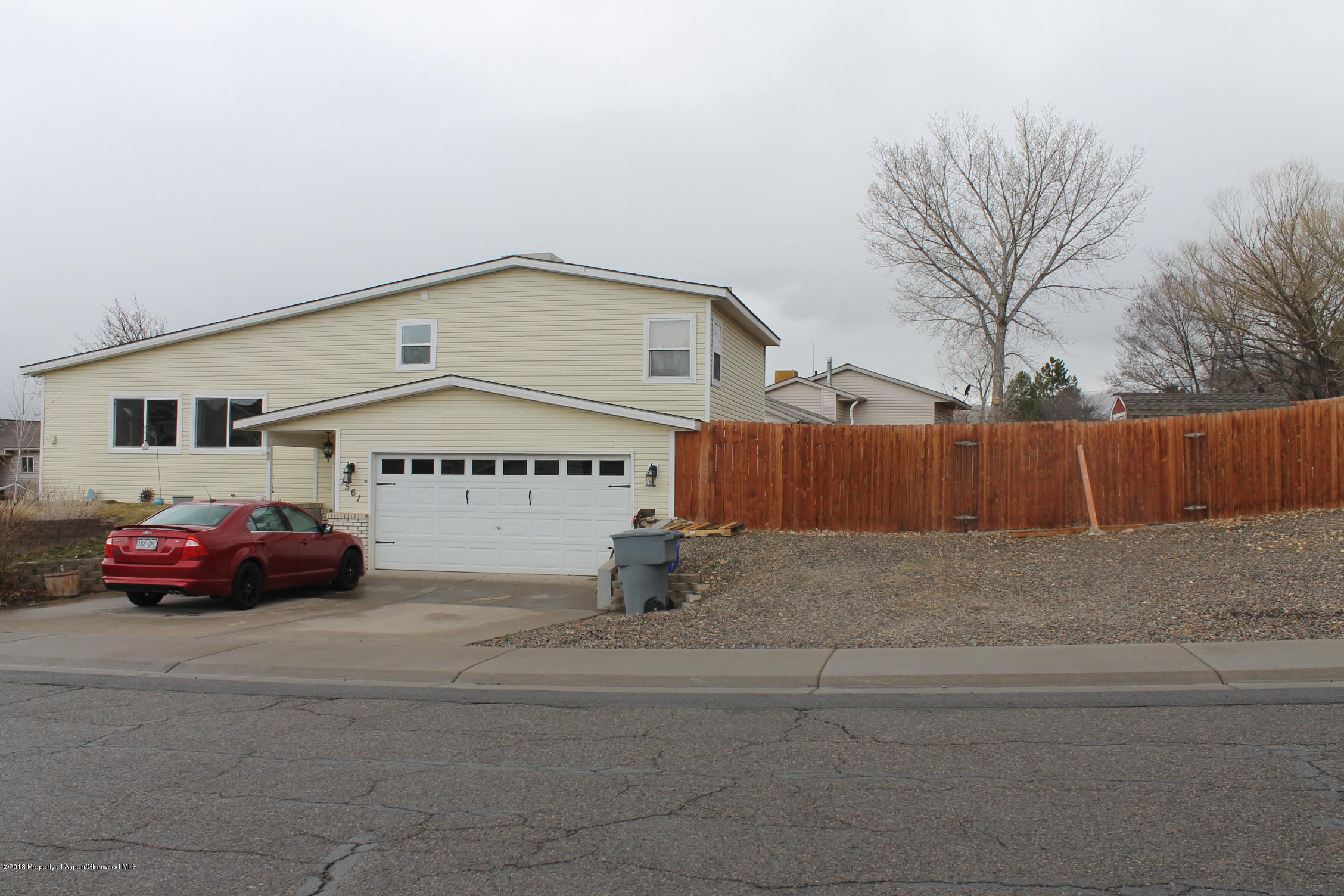 1561 East 12th Street Rifle, CO 81650 - Photo 3 of 23 a car parked in front of a house