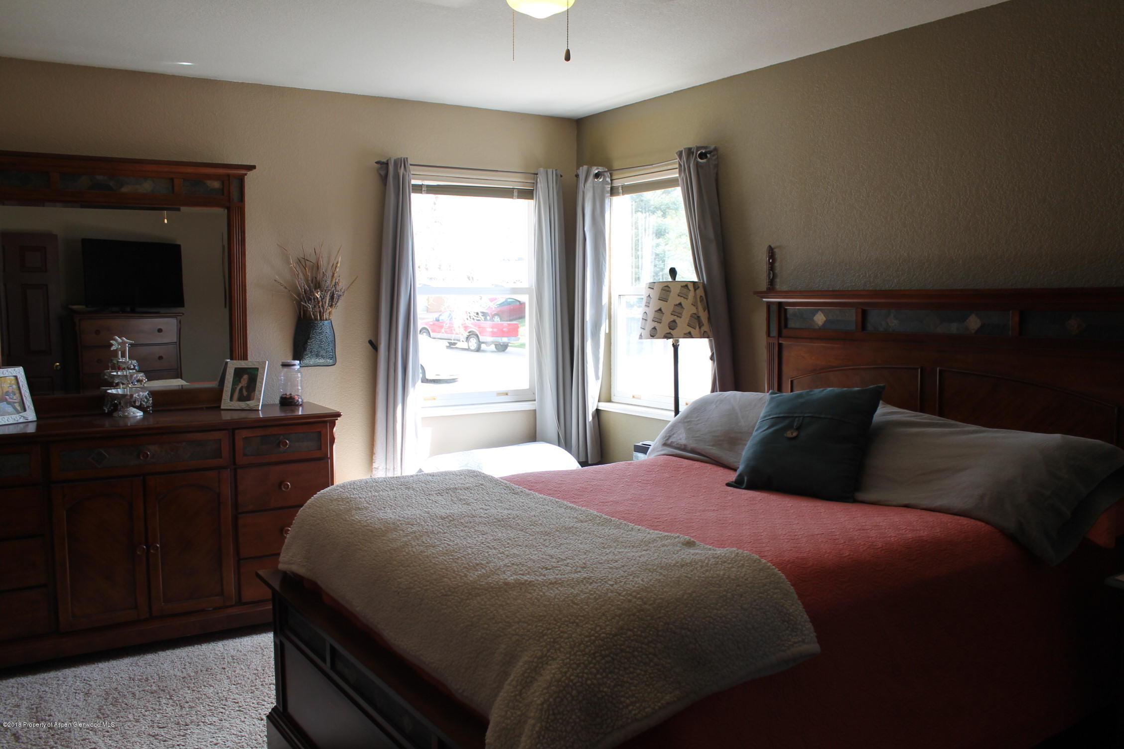 1561 East 12th Street Rifle, CO 81650 - Photo 7 of 23 a bedroom with a bed and a closet