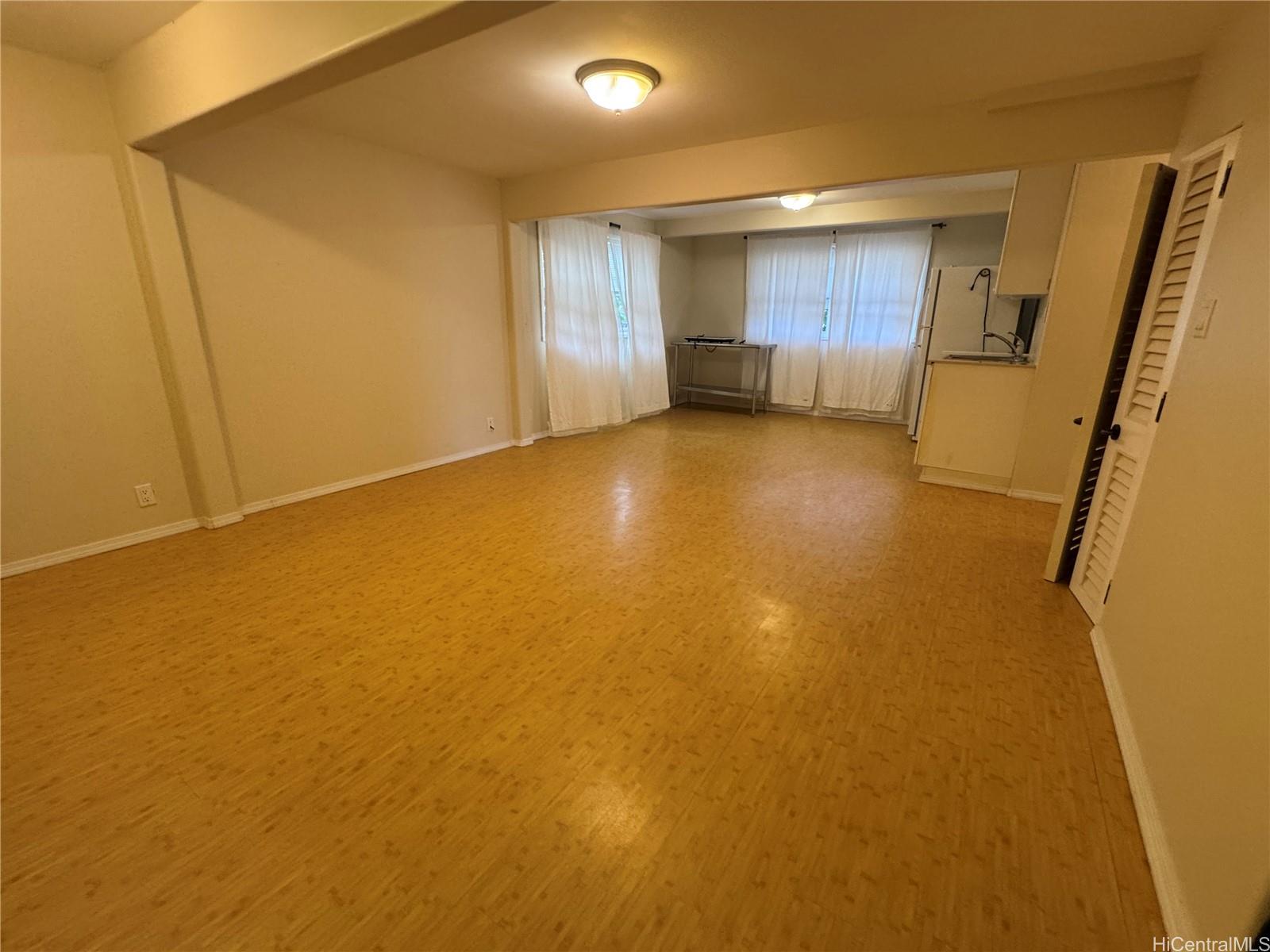 320 Hao Street Honolulu, HI 96821 - Photo 7 of 15 a view of an empty room with a window