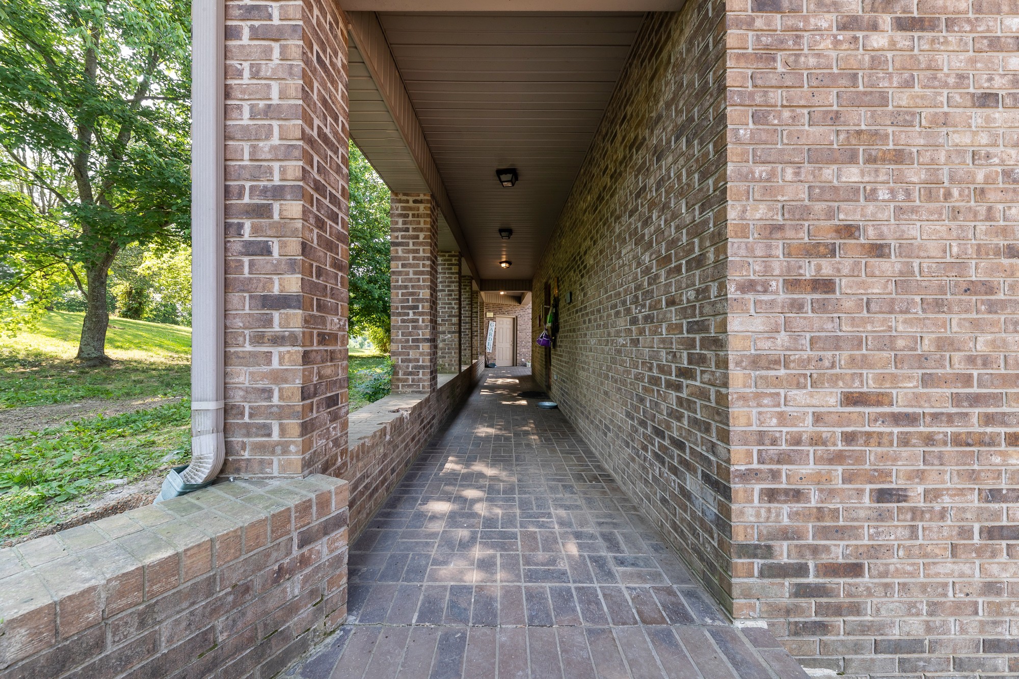 2150 Wilson Hill Road Lewisburg, TN 37091 - Photo 16 of 38 a view of a pathway both side of brick house