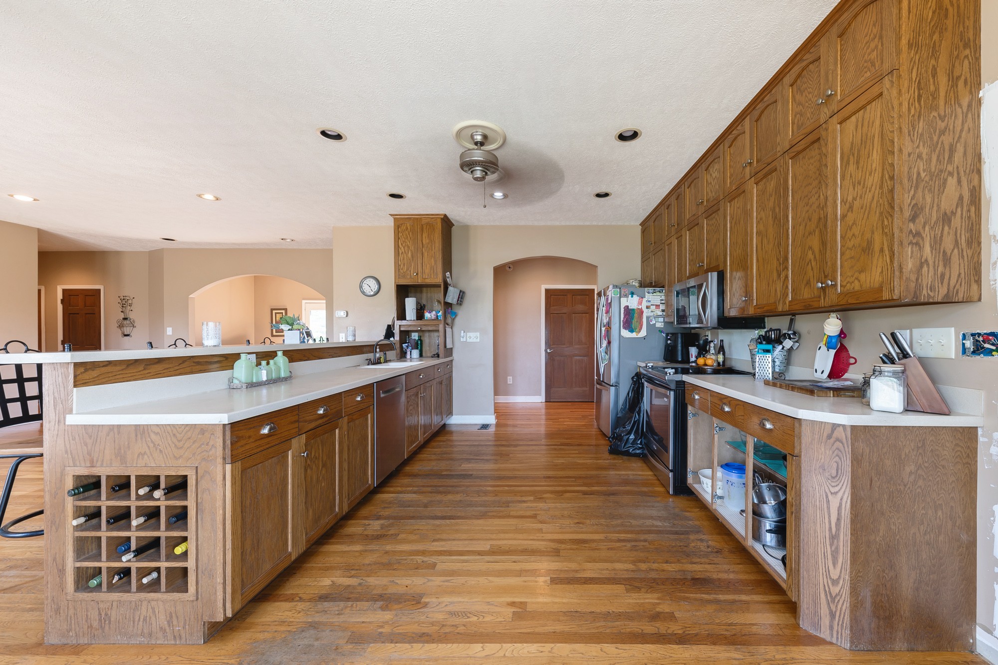 2150 Wilson Hill Road Lewisburg, TN 37091 - Photo 19 of 38 a kitchen with stainless steel appliances a sink and wooden cabinets