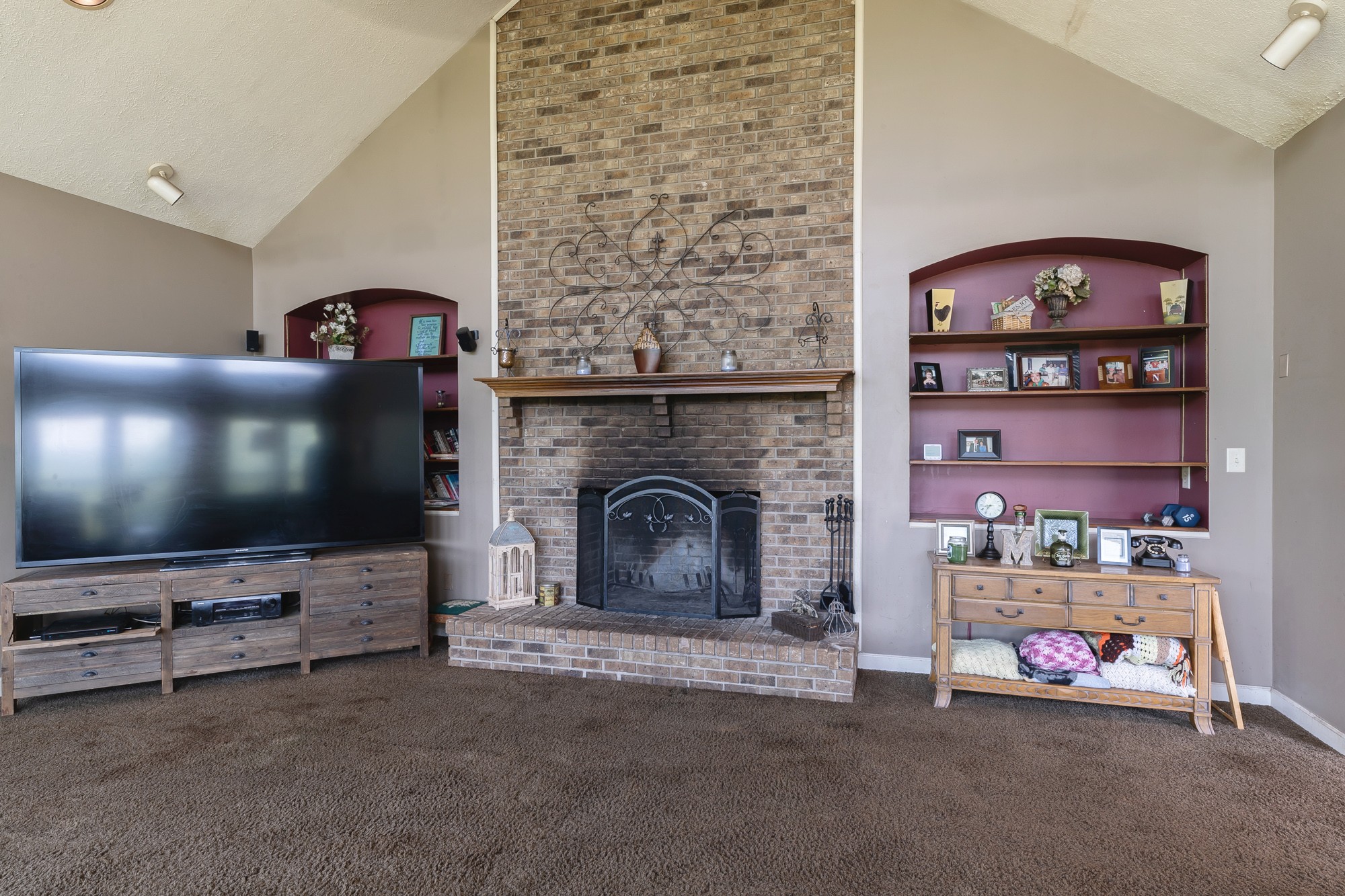 2150 Wilson Hill Road Lewisburg, TN 37091 - Photo 26 of 38 a living room with fireplace and a flat screen tv