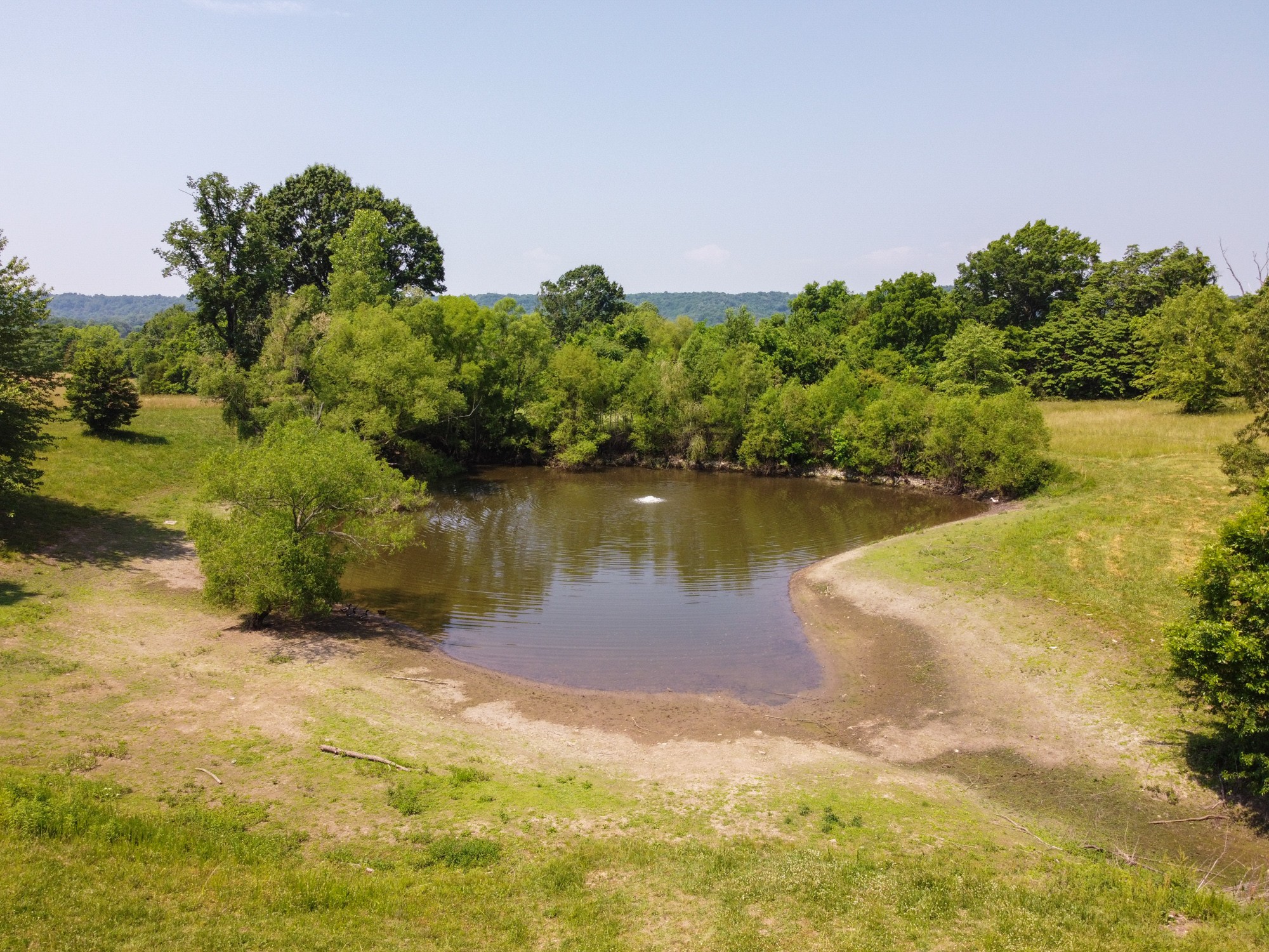 2150 Wilson Hill Road Lewisburg, TN 37091 - Photo 6 of 38 a view of a lake with houses in the background