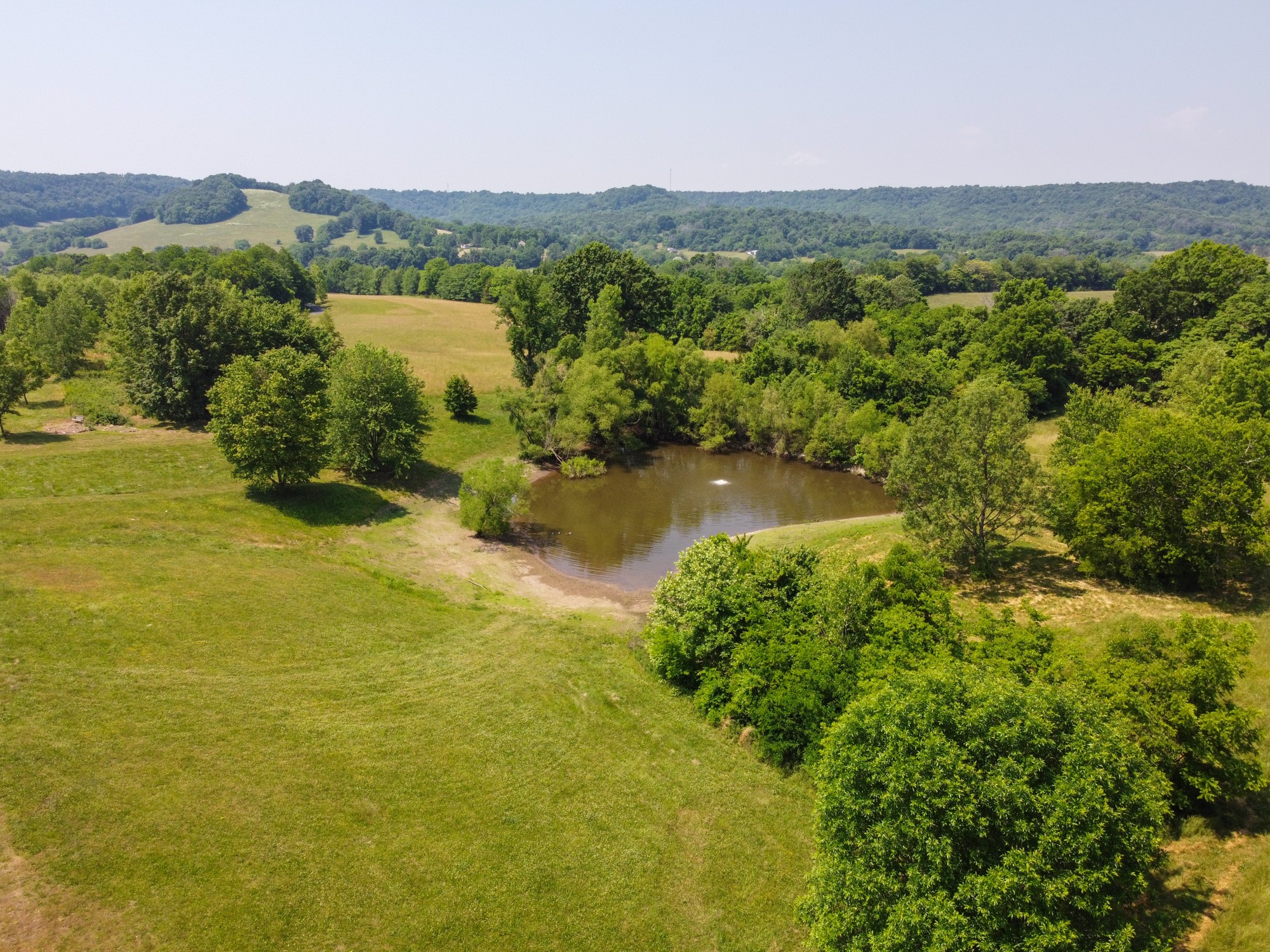 2150 Wilson Hill Road Lewisburg, TN 37091 - Photo 7 of 38 a view of a lake with a mountain in the background