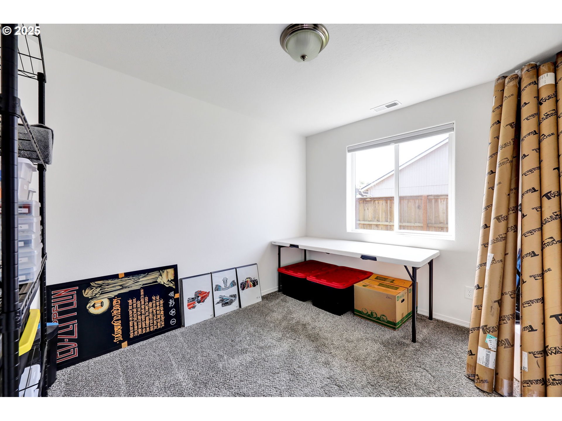 2057 South 59th Street Springfield, OR 97478 - Photo 18 of 28 a bedroom with furniture and window