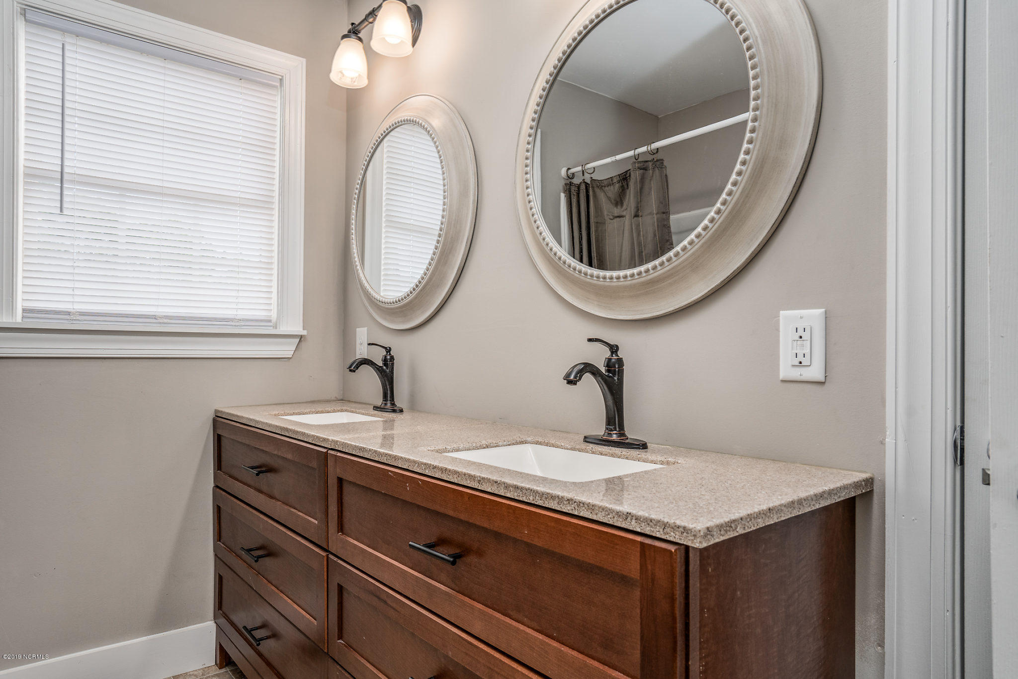 1304 Bethlehem Road Rocky Mount, NC 27803 - Photo 11 of 16 Close up view of vanity hard granite counter top...