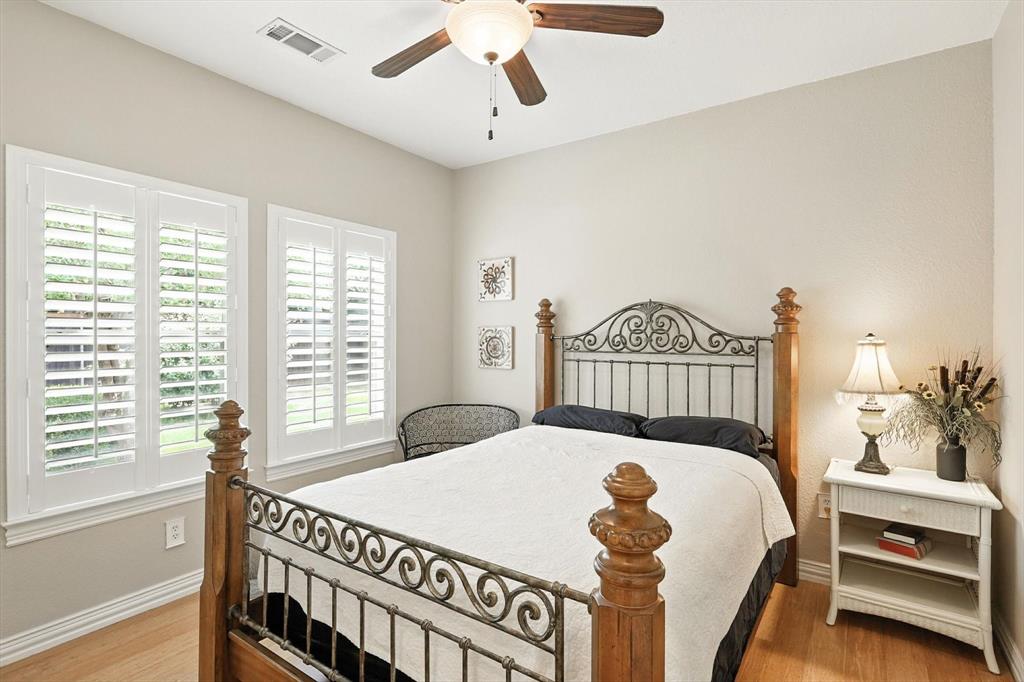 109 Visalia Lane Denton, TX 76210 - Photo 17 of 36 a bedroom with a bed and a window