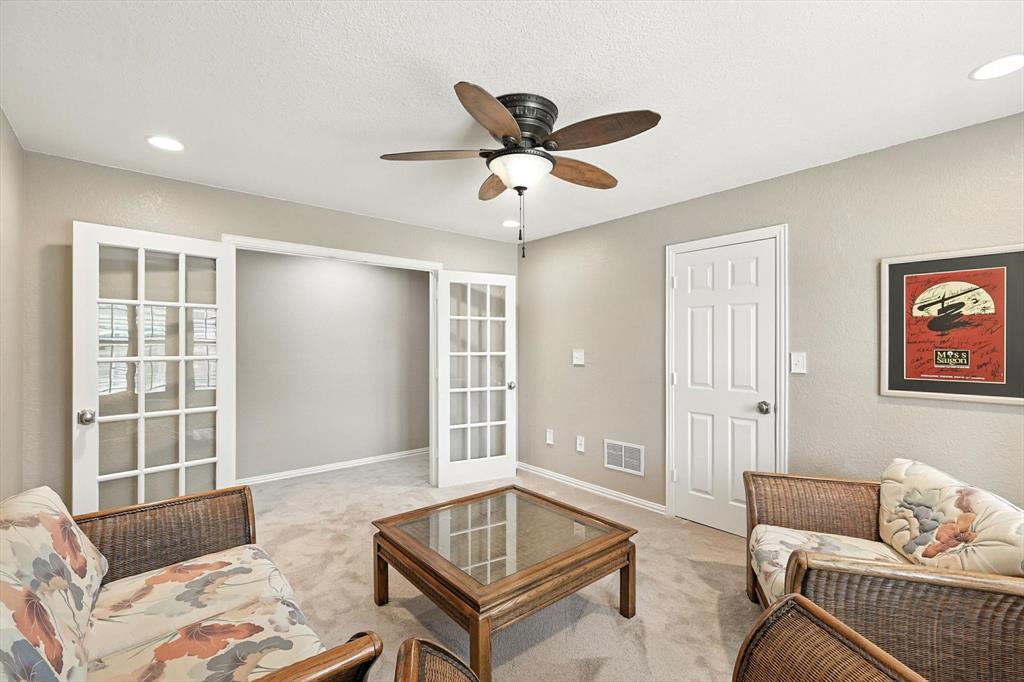109 Visalia Lane Denton, TX 76210 - Photo 20 of 36 a living room with furniture and a window