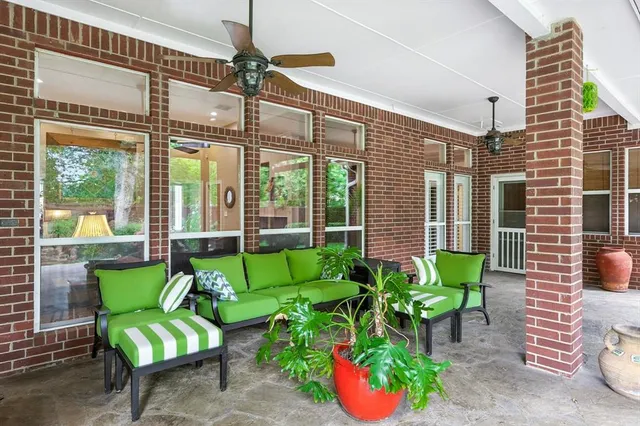 a view of a chairs and table in a patio