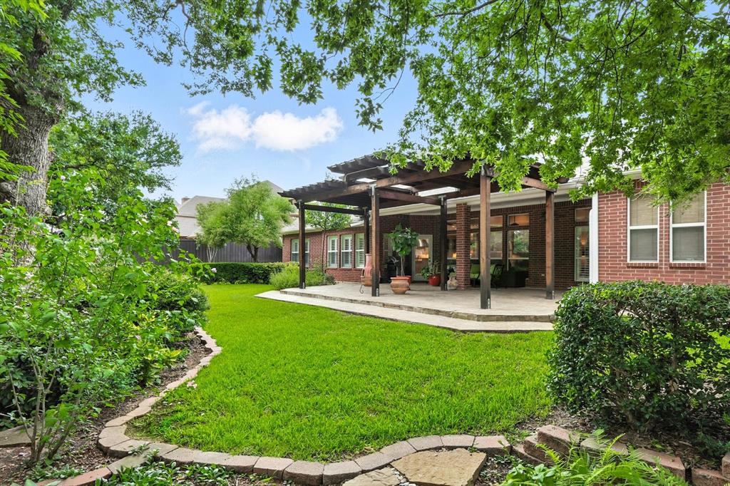 109 Visalia Lane Denton, TX 76210 - Photo 30 of 36 a view of a house with a yard porch and sitting area