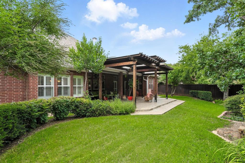 109 Visalia Lane Denton, TX 76210 - Photo 32 of 36 a view of an house with backyard and porch