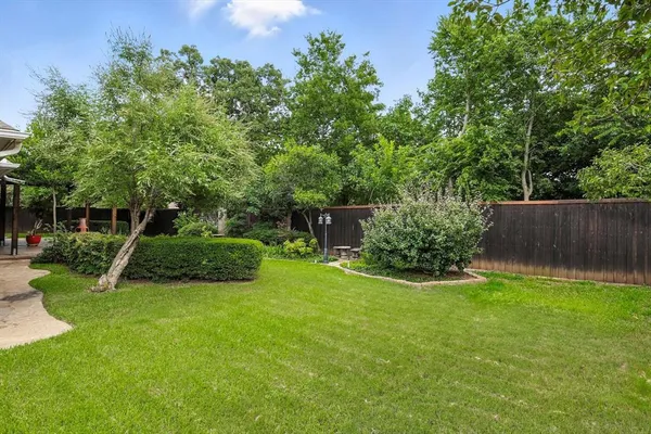 a view of a garden with a slide