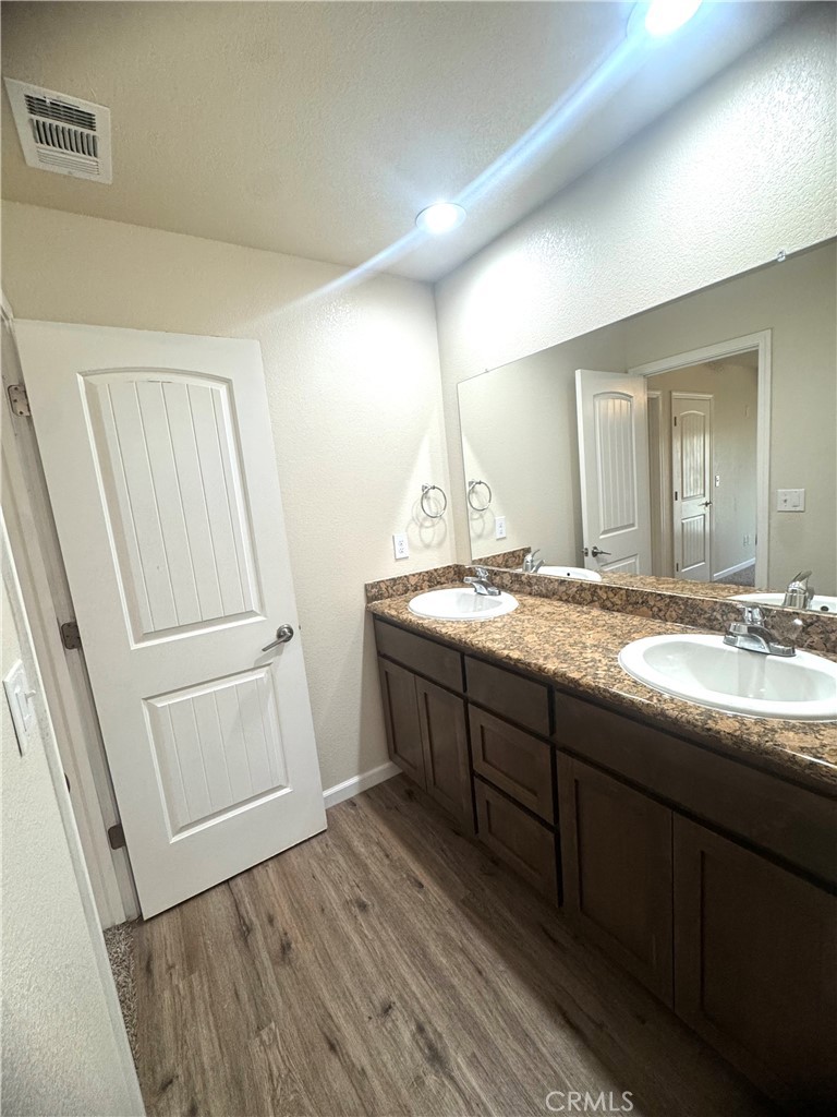 1339 Playa Del Rey Drive Merced, CA 95348 - Photo 28 of 48 a bathroom with a sink and mirror