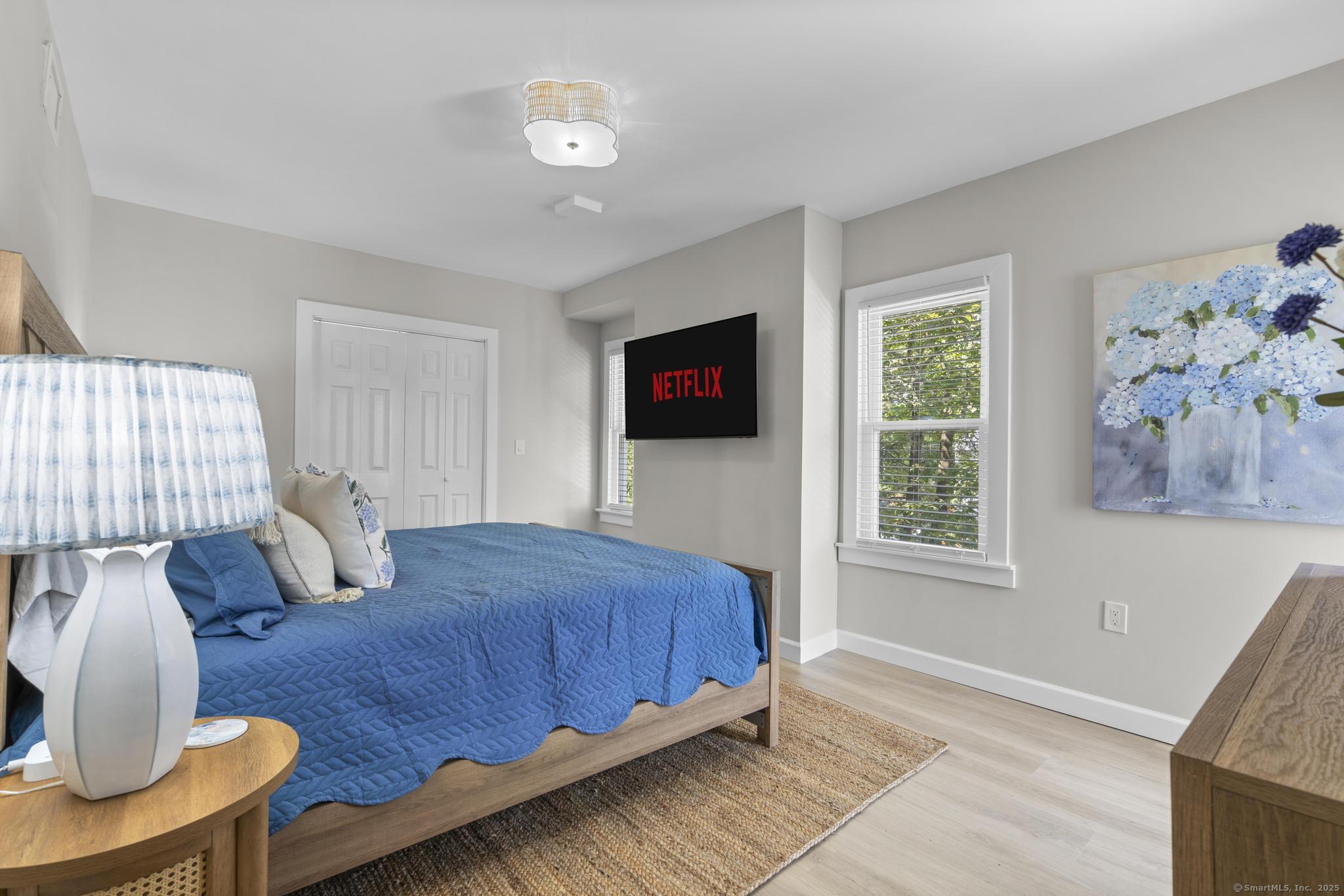 270 Elm Street, Unit 2 Groton, CT 06340 - Photo 11 of 36 a bedroom with furniture and a window