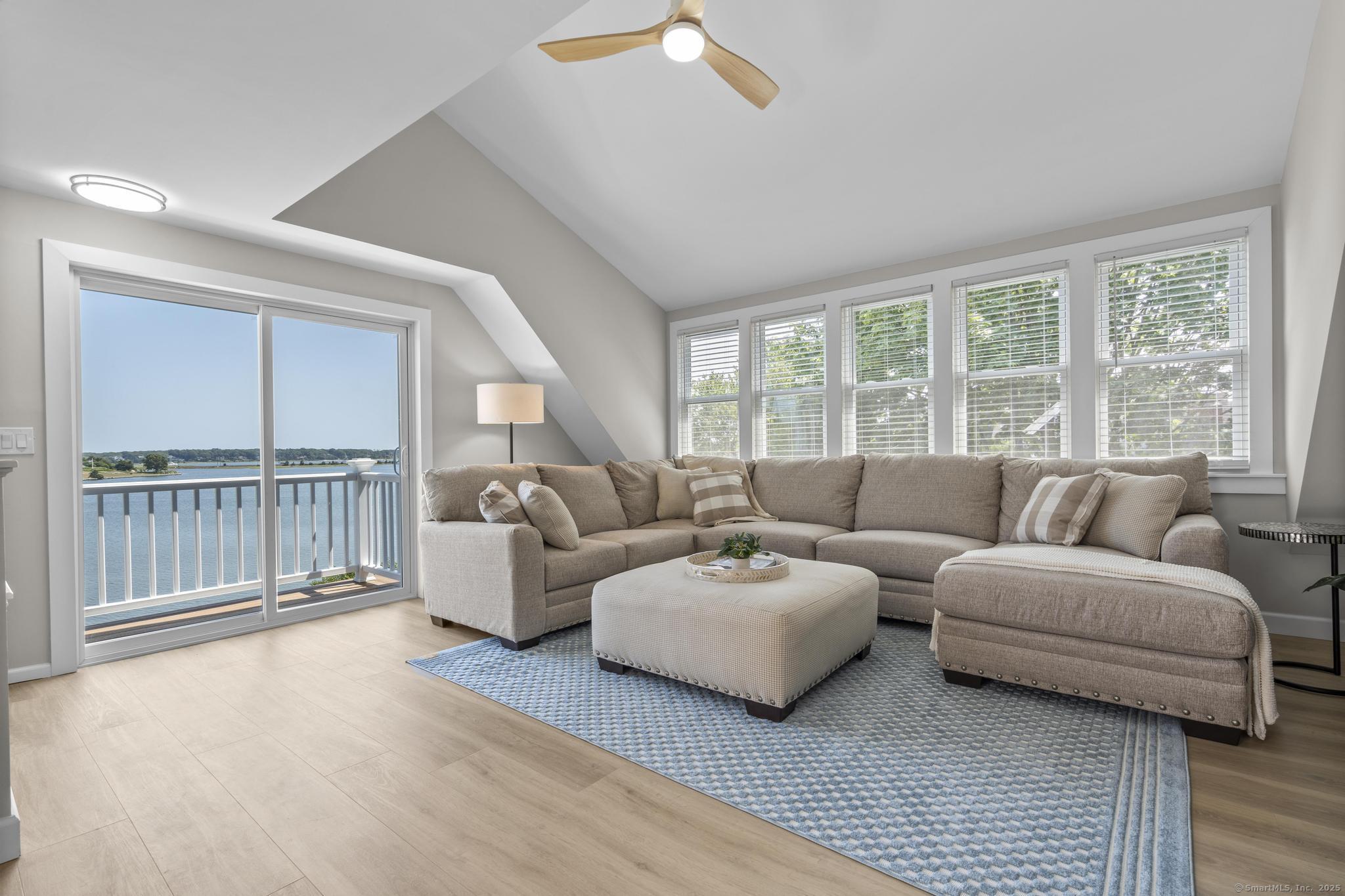 270 Elm Street, Unit 2 Groton, CT 06340 - Photo 26 of 36 a living room with furniture and a large window