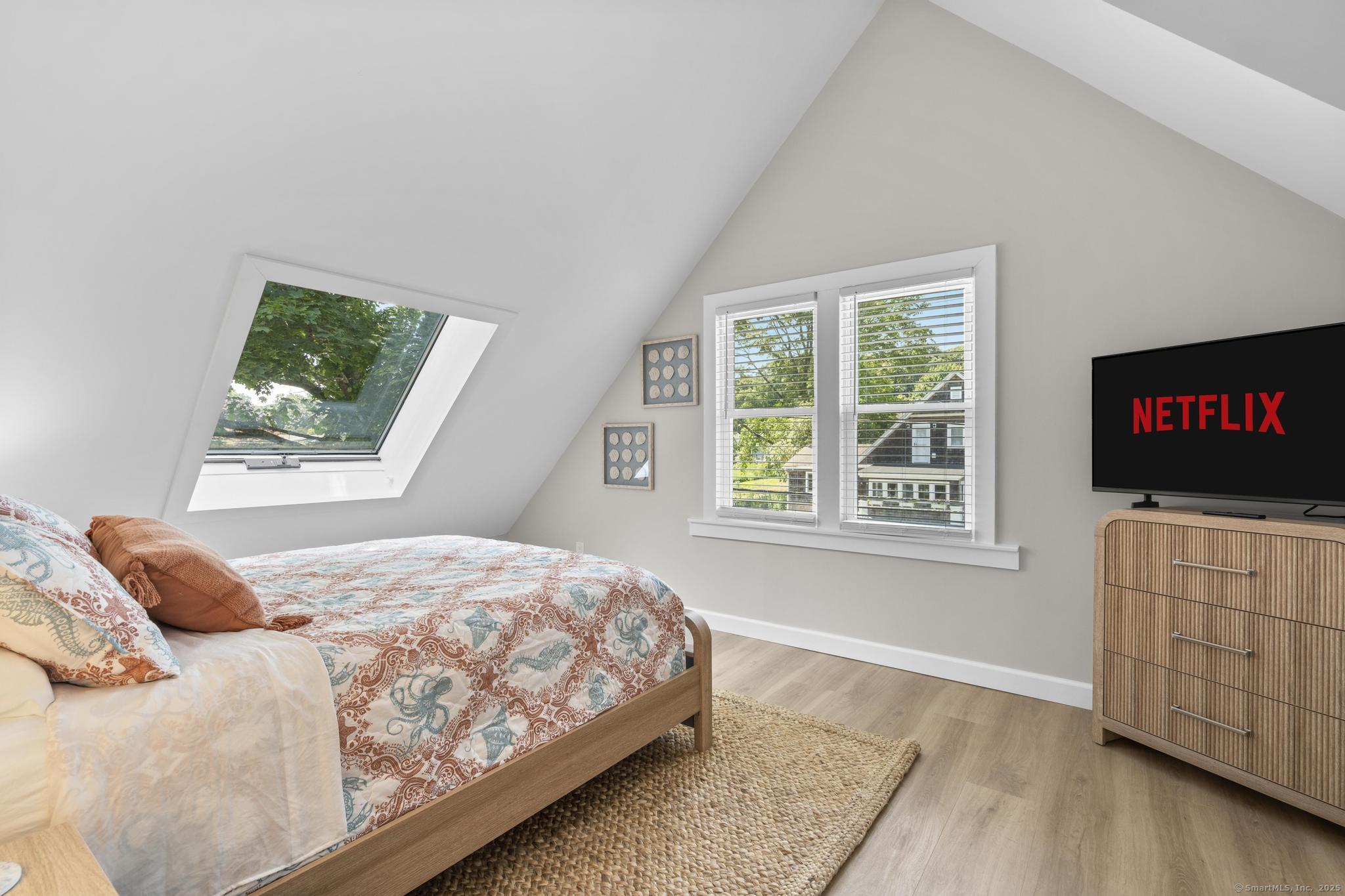 270 Elm Street, Unit 2 Groton, CT 06340 - Photo 36 of 36 a bedroom with a bed and a window