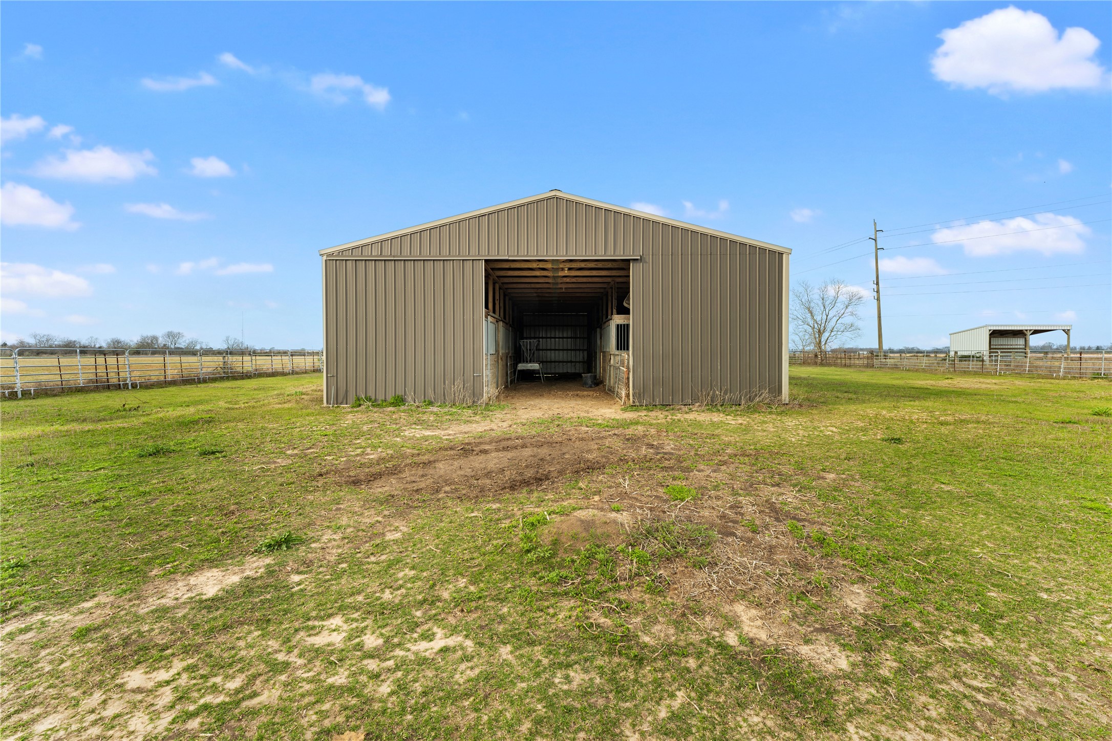 311 County Road 18 Damon, TX 77430 - Photo 21 of 39 a front view of a house with a yard
