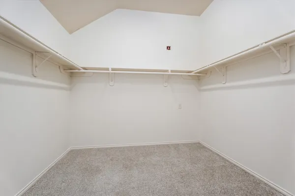a bathroom with a tub and shower