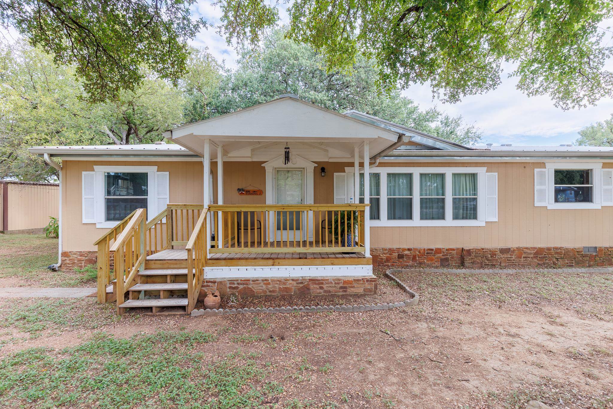 200 Munson Tow, TX 78672 - Photo 1 of 29 a front view of a house with a yard