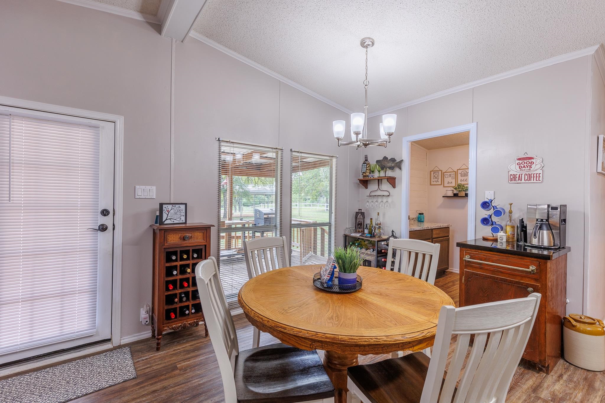 200 Munson Tow, TX 78672 - Photo 11 of 29 a view of a dining room with furniture window and wooden floor