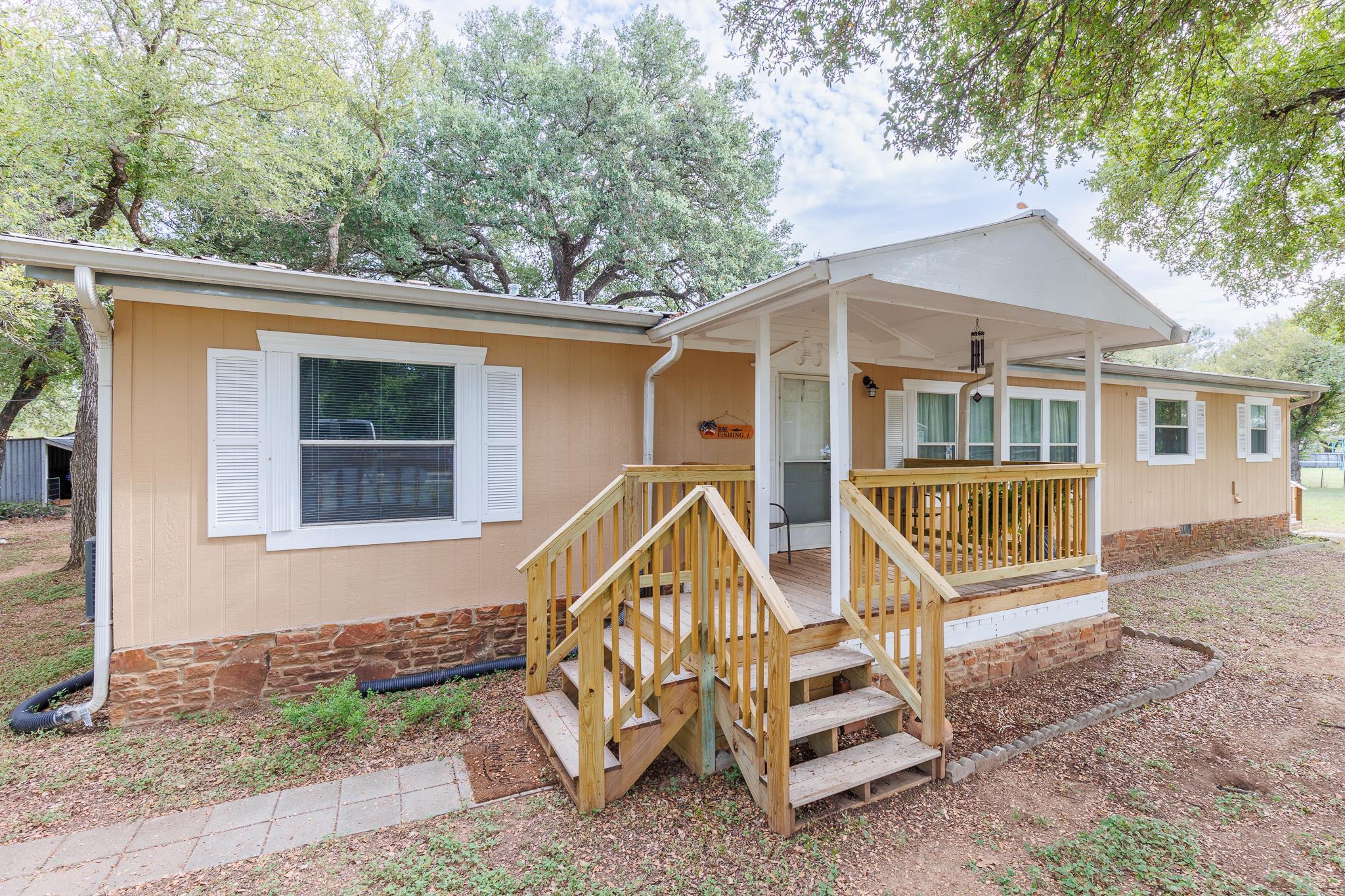 200 Munson Tow, TX 78672 - Photo 2 of 29 a view of a house with a yard