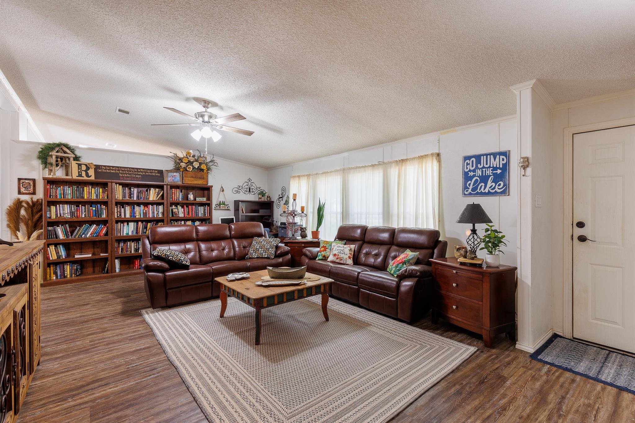 200 Munson Tow, TX 78672 - Photo 4 of 29 a living room with furniture and wooden floor