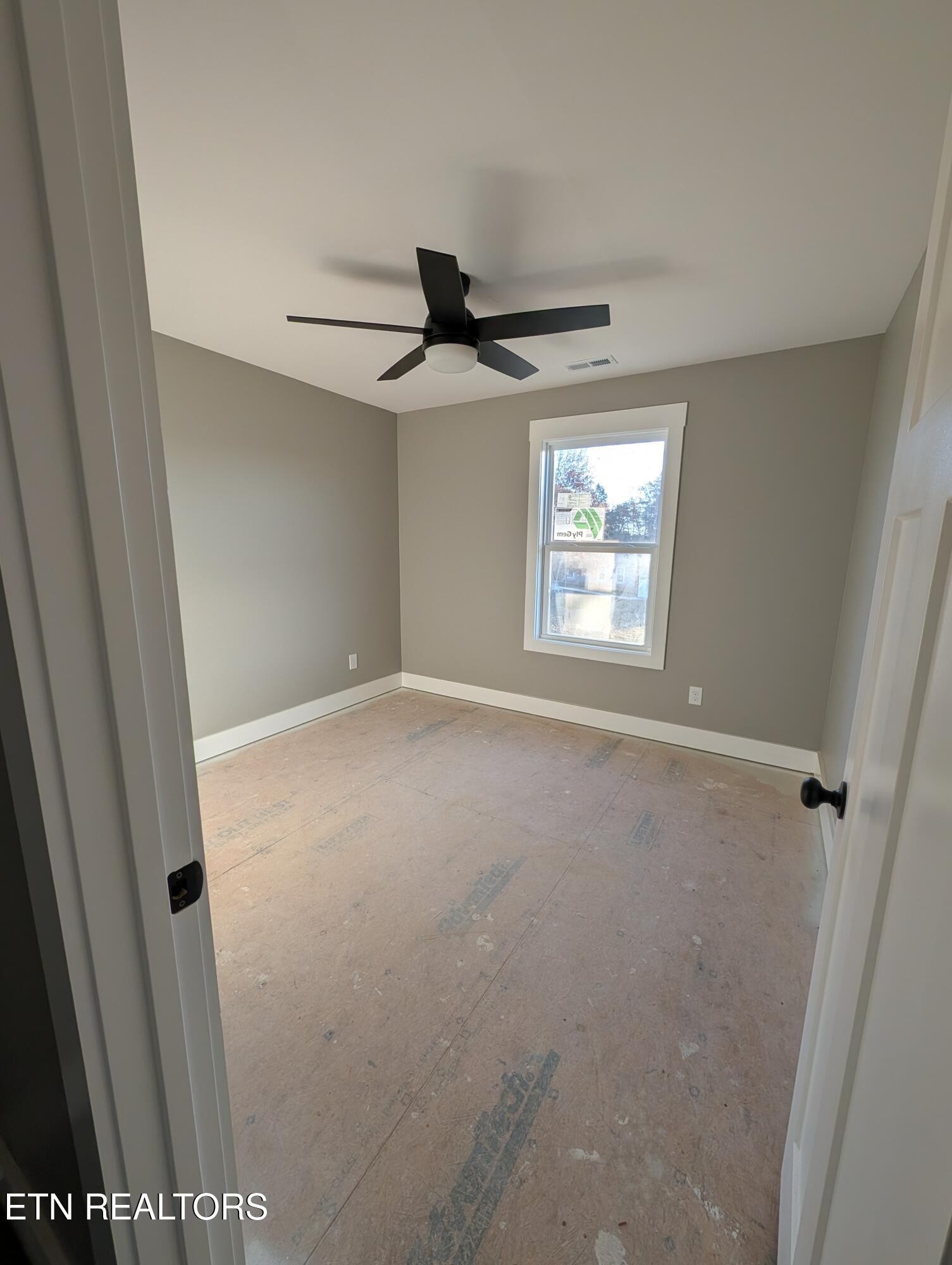 144 Abbott Road Lenoir City, TN 37771 - Photo 17 of 24 a view of an empty room and window