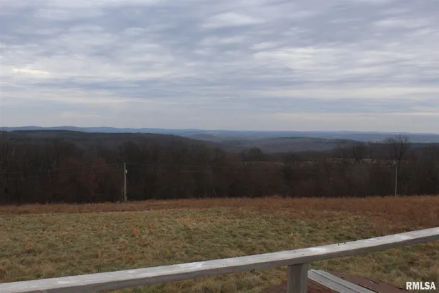 a view of swimming pool from a balcony