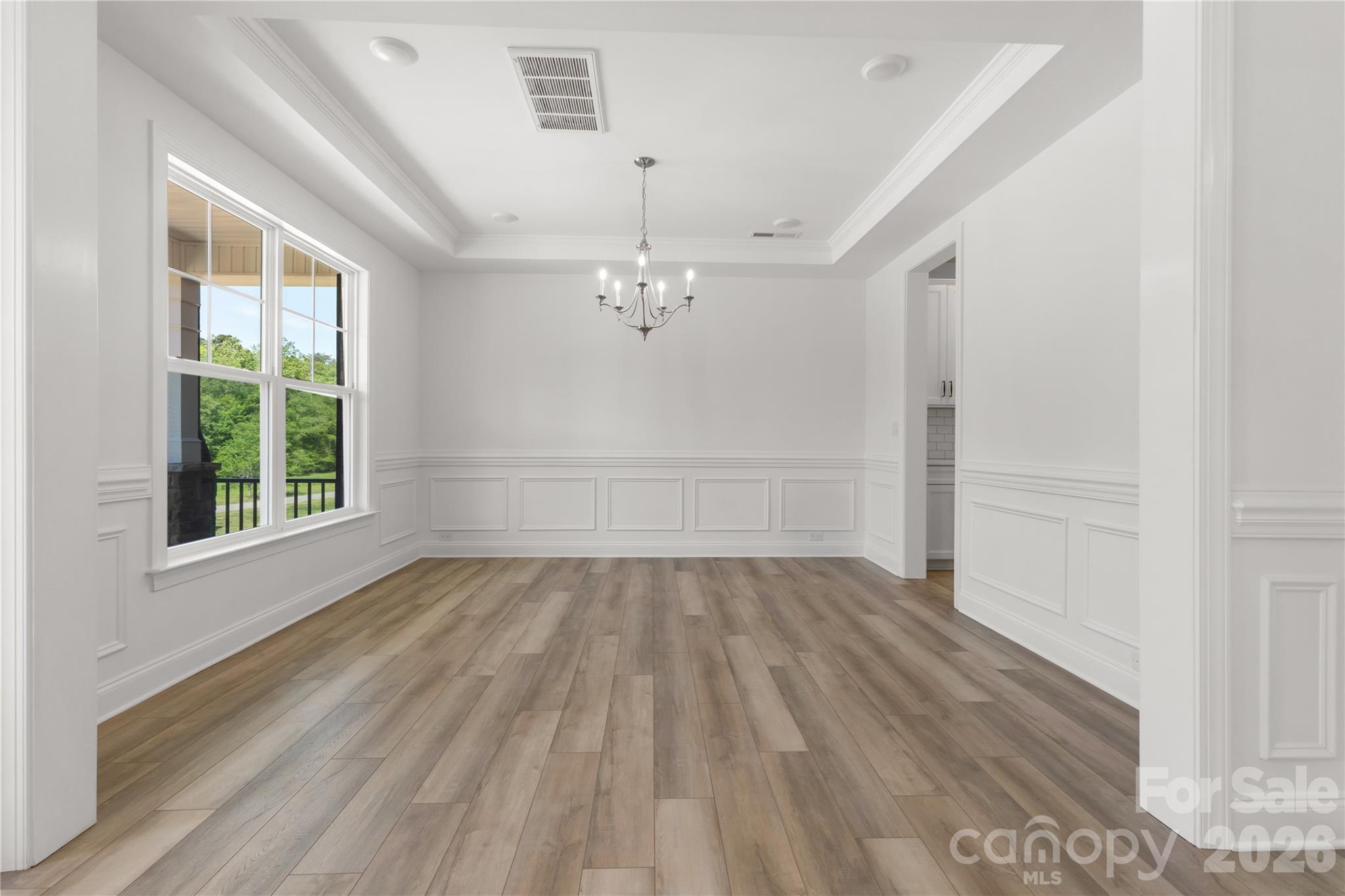 5944 Bakers Point Hickory, NC 28602 - Photo 20 of 39 a view of an empty room with wooden floor and a window