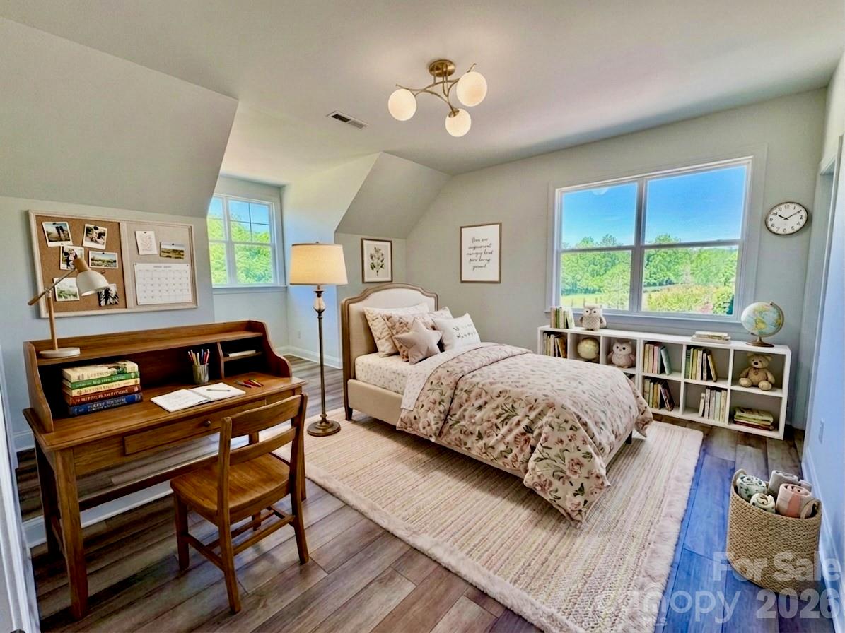 5944 Bakers Point Hickory, NC 28602 - Photo 39 of 39 a bedroom with a bed a dresser and a large window