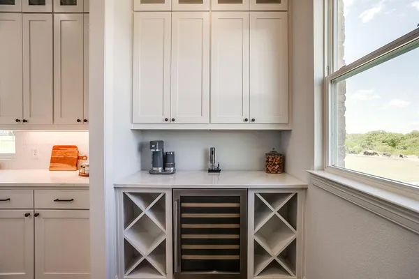a view of cabinets and window