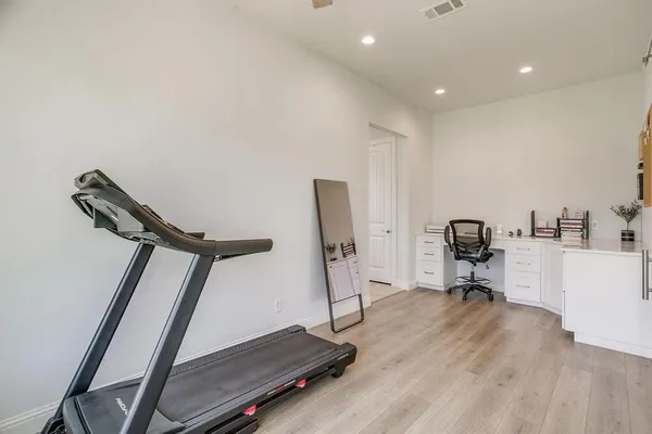 a view of a room with gym equipment