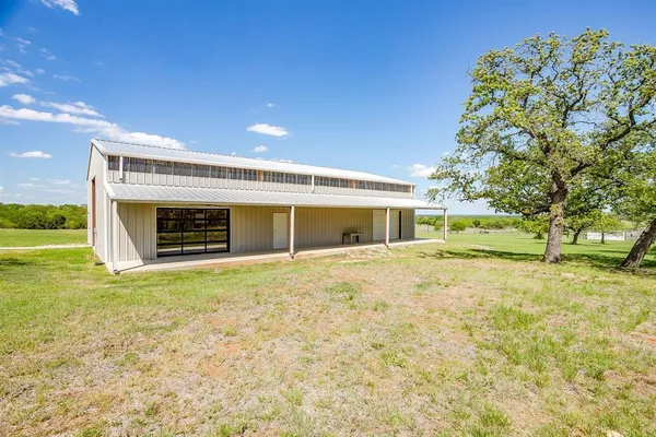 a house view with a outdoor space