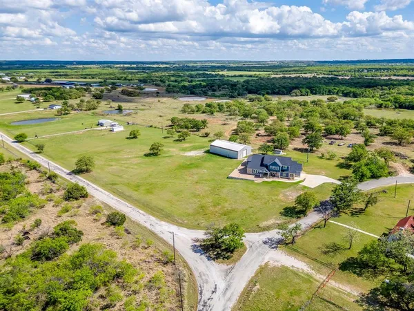 a view of an swimming pool and an outdoor seating