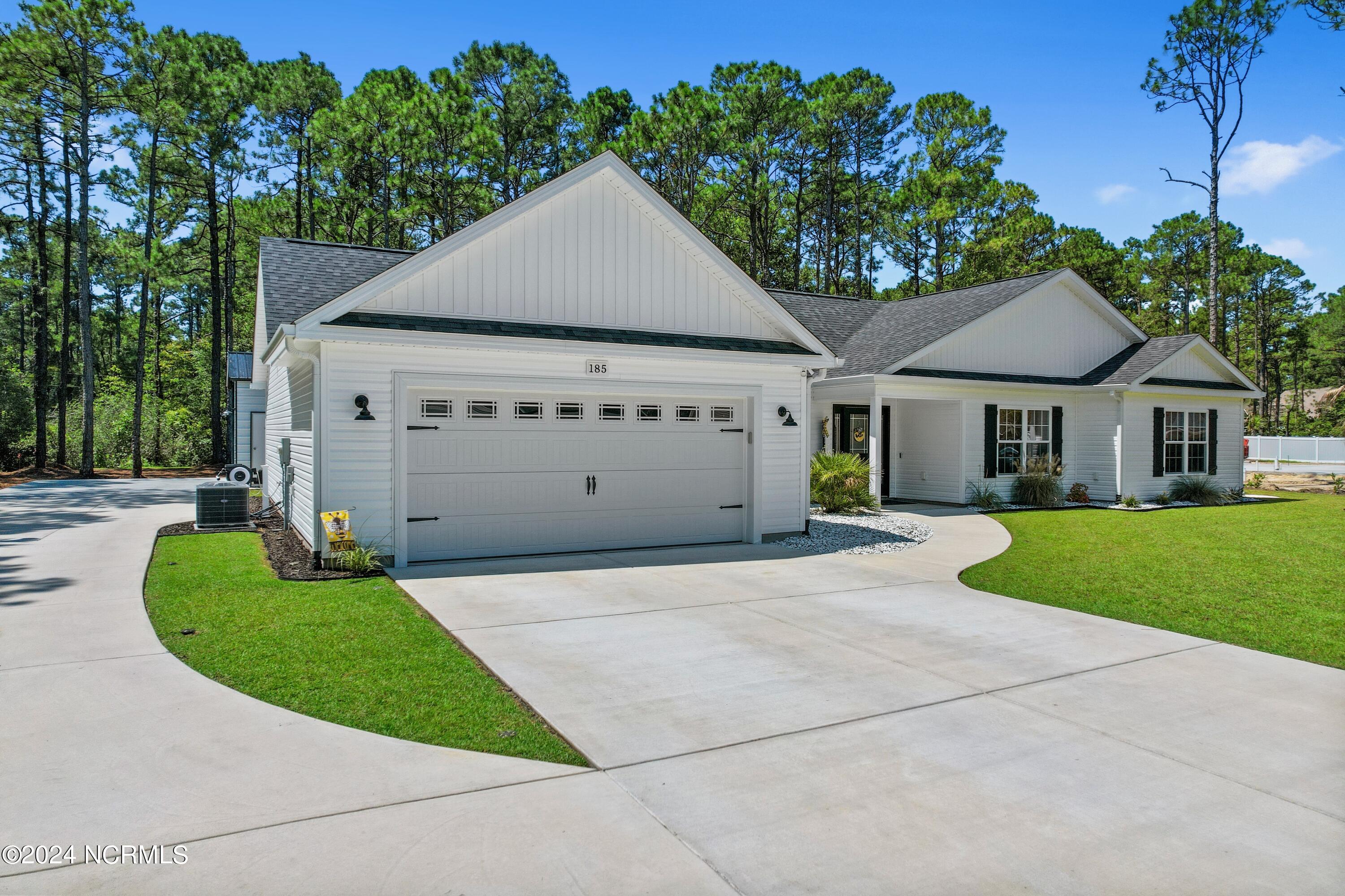 185 Boundary Loop Road Northwest Calabash, NC 28467 - Photo 2 of 56 Front/additional driveway